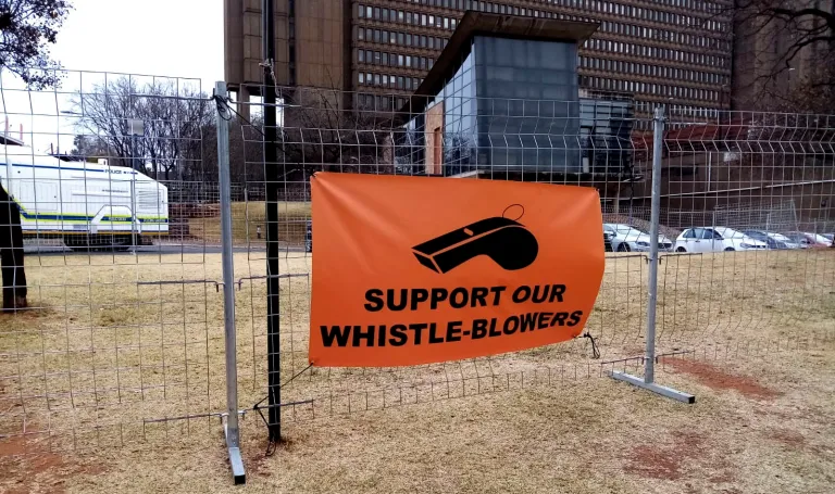 A banner calling for President Ramaphosa to support whistle-blowers.