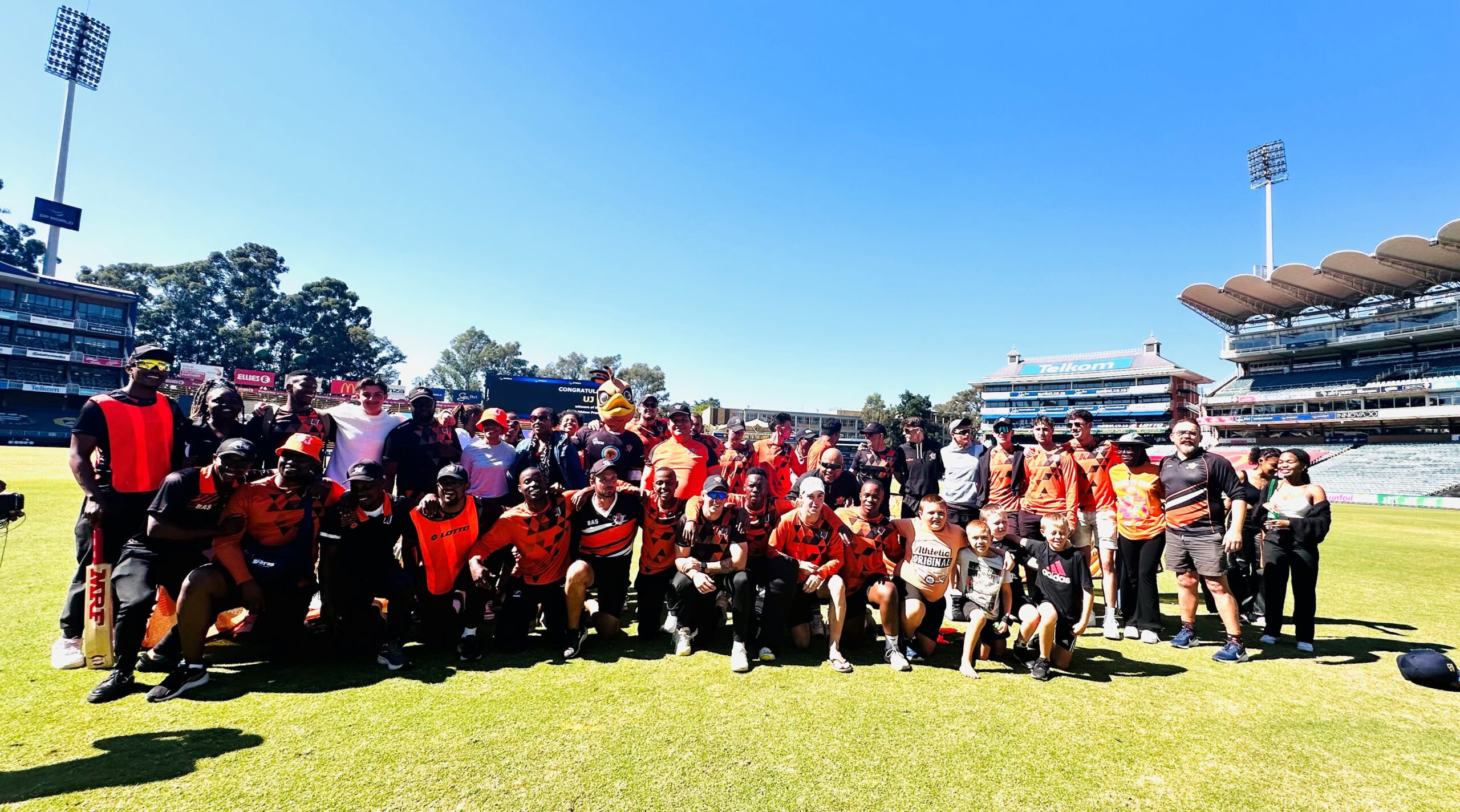 UJ cricket with supporters at DP World Wanderers Stadium post the Black Widow Premier B final match