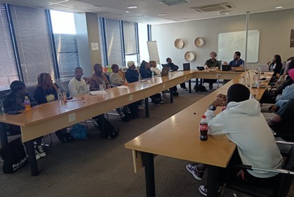 Student attendees of the workshop presenting their reflections on translating political science texts into indegenous South African languages. Photo by Joy Mosia.