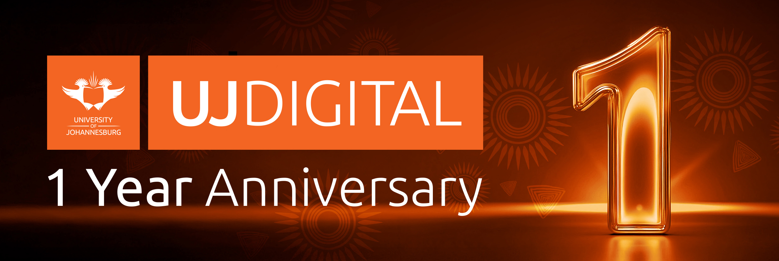 Banner announcing UJ Digital 1 Year Anniversary with an orange logo block and a glowing numeric 1 on a dark orange background.